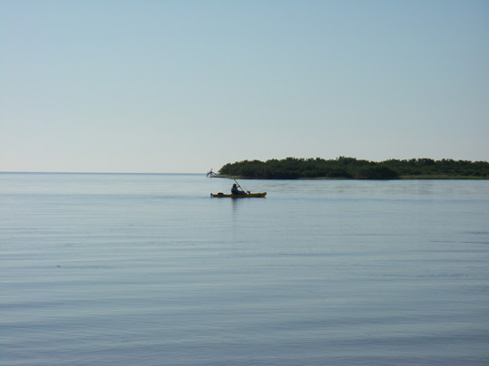 Kayak fisherman at Cedar Key, Florida