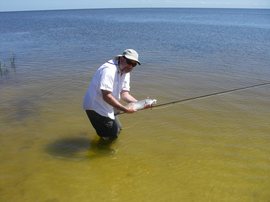 Byron holding a redfish.