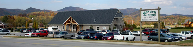 Little River Outfitters building and parking lot.