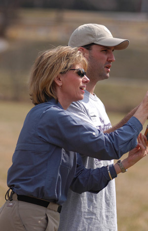 Tee working with a beginner fly fishing student.