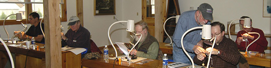 Walter Babb teaching a fly tying class.