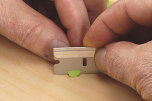 Cutting a flat surface at the rear of the body.