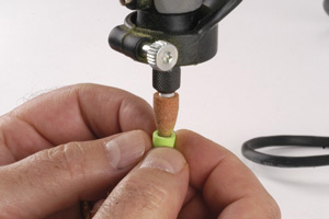 Cupping the face of a popper using a Dremel Tool.